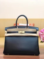 Birkin box black with gold buckle