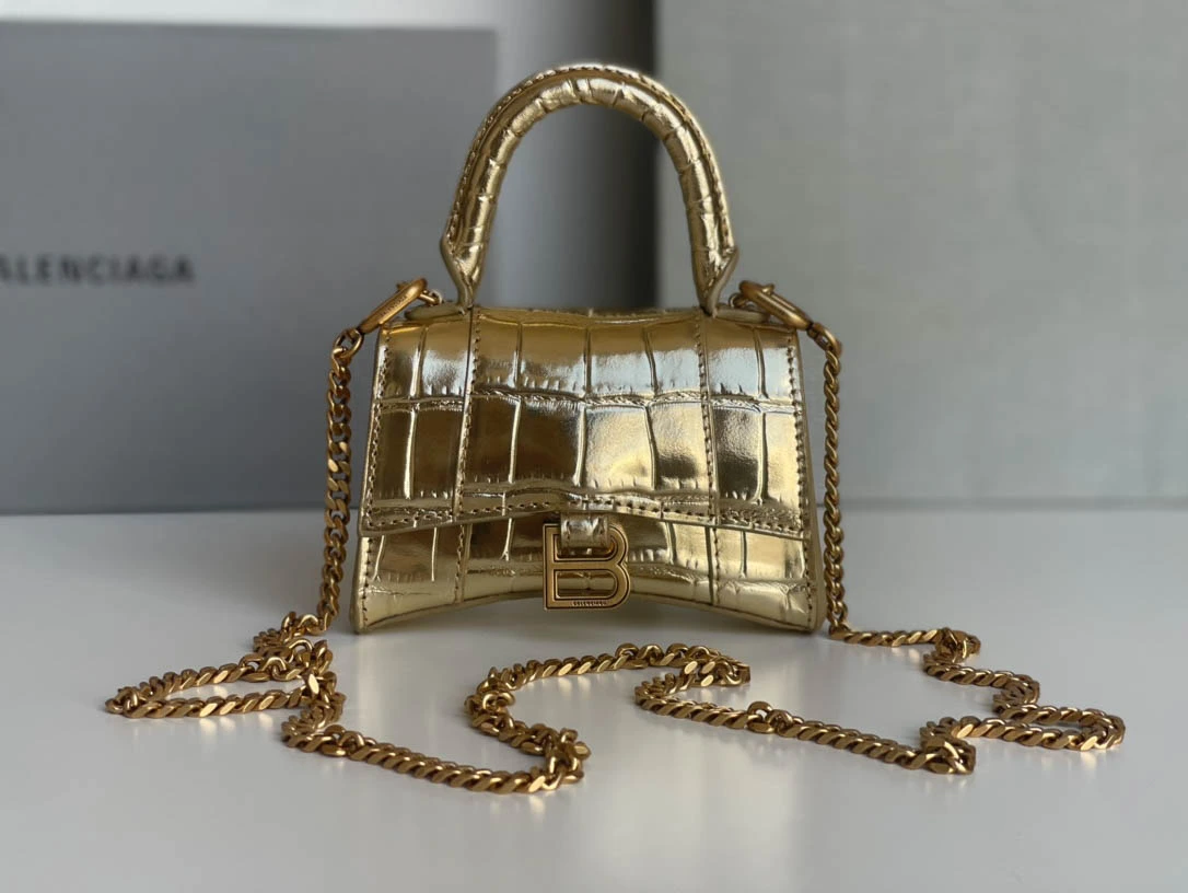 iae91dd8cd75dfcba6ec867132679638b.webp Balenciaga Hourglass Bag Orange Size: 169 Size: 12104.5cm - Image 1