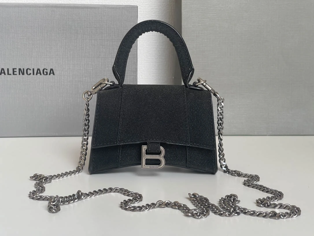 icf7ce14c74e0a74e57a28b054a4660c2.webp Balenciaga Hourglass Bag Model: 169 Size: 12104.5cm - Image 1