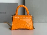 Balenciaga hourglass bag orange model: 169 size: 12104.5cm - Image 7